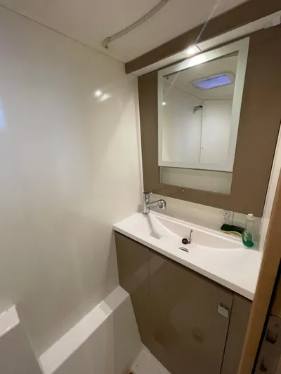  Yacht Photos Pics 2018 Fountaine Pajot MY 37 bathroom with modern sink and mirror.