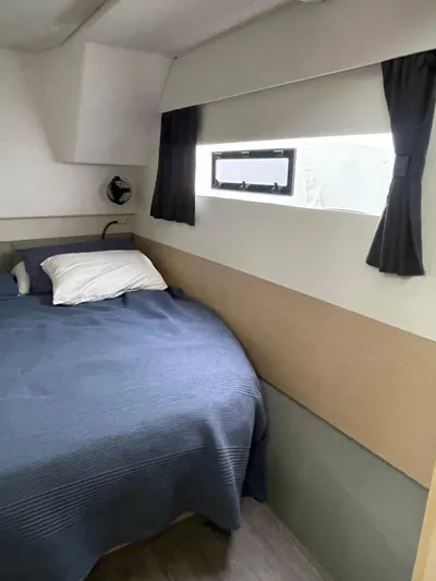 Yacht Photos Pics 2018 Fountaine Pajot MY 37 cabin with bed, window, and curtains.