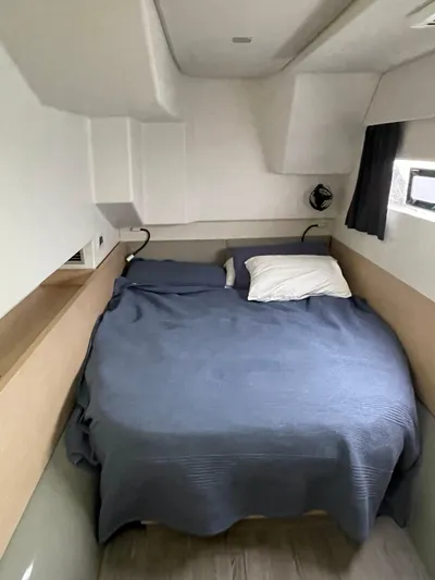  Yacht Photos Pics Cozy bedroom in 2018 Fountaine Pajot MY 37 yacht with blue bedding.