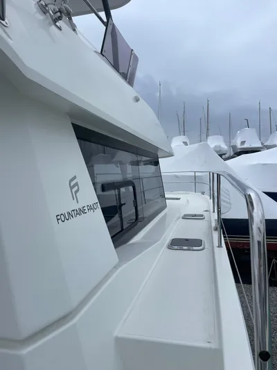  Yacht Photos Pics 2018 Fountaine Pajot MY 37 yacht docked, showcasing sleek design and modern features.