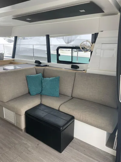  Yacht Photos Pics Interior of 2018 Fountaine Pajot MY 37 yacht with modern seating and decor.