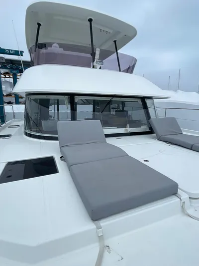  Yacht Photos Pics 2018 Fountaine Pajot MY 37 yacht with gray sun loungers on deck.
