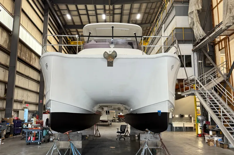  Yacht Photos Pics 2018 Fountaine Pajot MY 37 yacht in a shipyard, front view.