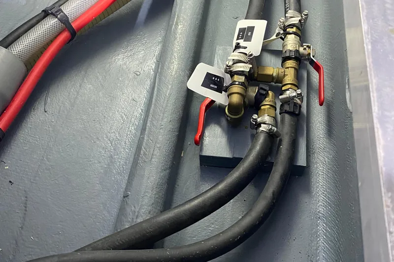 Peems Yacht Photos Pics Plumbing system with valves and hoses on a 2022 Outremer 45 yacht.