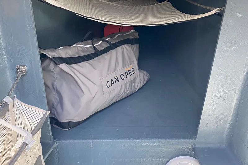 Peems Yacht Photos Pics Storage compartment in 2022 Outremer 45 sailboat with a CANOPEE bag.