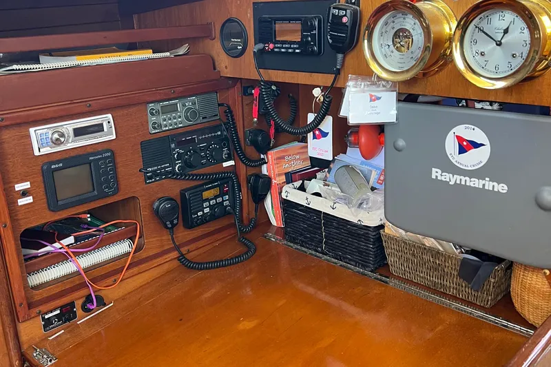 Courage Yacht Photos Pics Navigation equipment and controls inside a 1980 Hinckley 43 sailboat cabin.