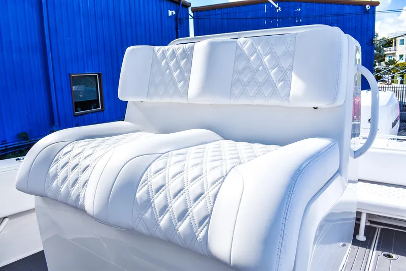  Yacht Photos Pics Luxurious seating on 2022 Invincible 33 Open Fisherman boat with diamond-stitched upholstery.