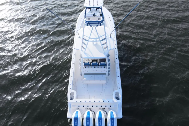  Yacht Photos Pics 2024 SeaVee 420Z boat on water, aerial view, showcasing sleek design and powerful engines.