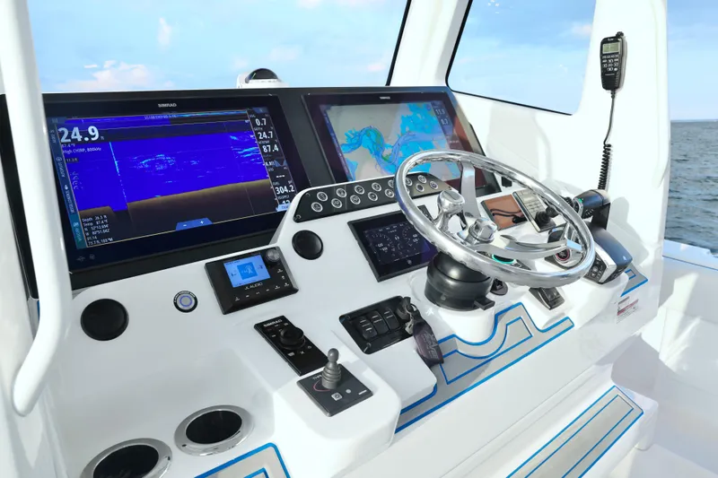  Yacht Photos Pics 2024 SeaVee 420Z boat dashboard with advanced navigation and control systems.