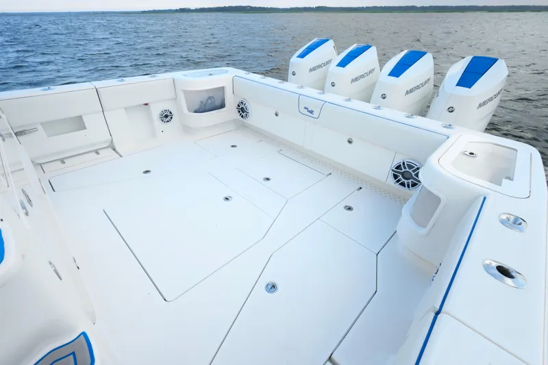  Yacht Photos Pics 2024 SeaVee 420Z boat deck with four Mercury outboard engines on open water.