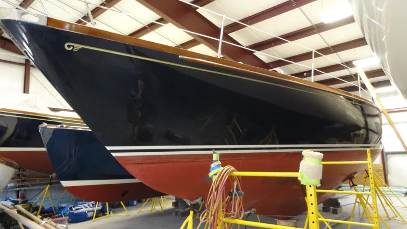 Courage Yacht Photos Pics 1980 Hinckley 43 sailboat in storage, showcasing sleek design and classic craftsmanship.