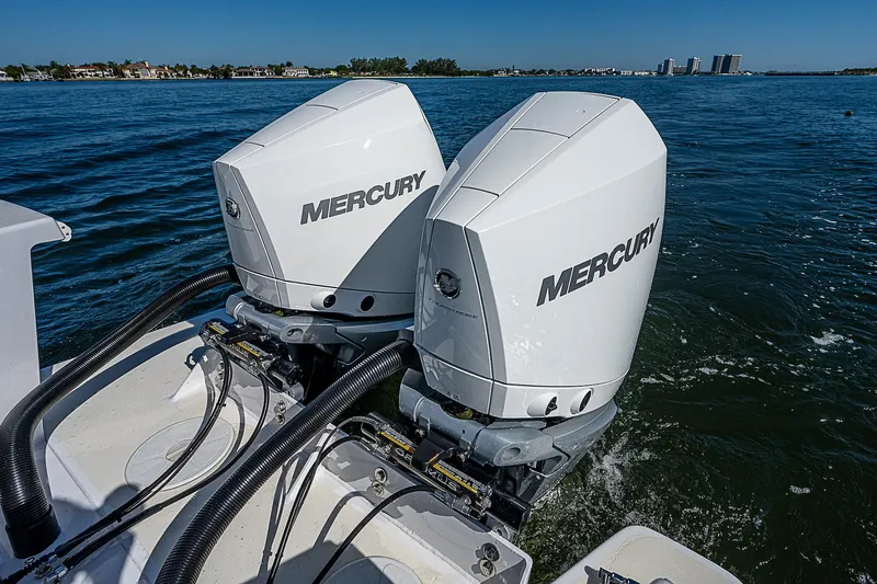  Yacht Photos Pics Twin Mercury outboard engines on a 2020 Birdsall 30 CC boat in open water.