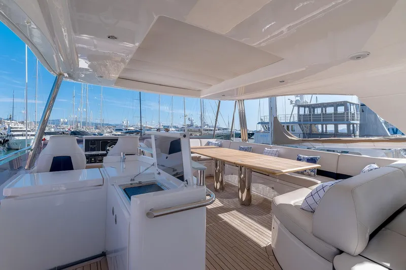  Yacht Photos Pics Luxurious 2014 Princess 72 Motor Yacht with spacious deck and elegant seating area.