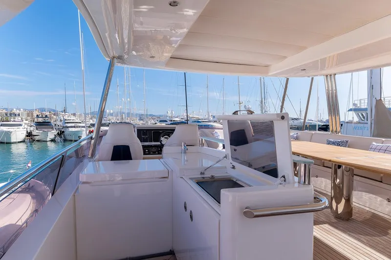  Yacht Photos Pics Luxurious 2014 Princess 72 Motor Yacht with spacious deck and marina view.