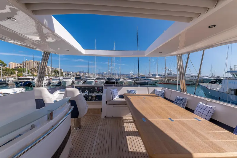  Yacht Photos Pics Luxurious 2014 Princess 72 Motor Yacht with spacious deck and marina view.