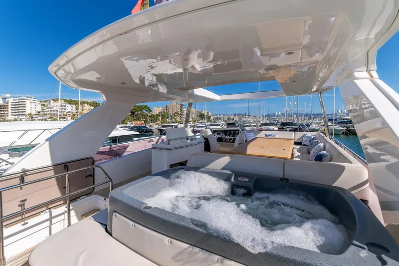  Yacht Photos Pics Luxurious 2014 Princess 72 Motor Yacht with jacuzzi on deck, docked in marina.