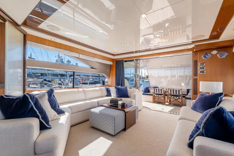  Yacht Photos Pics Luxurious interior of 2014 Princess 72 Motor Yacht with elegant seating and marina view.