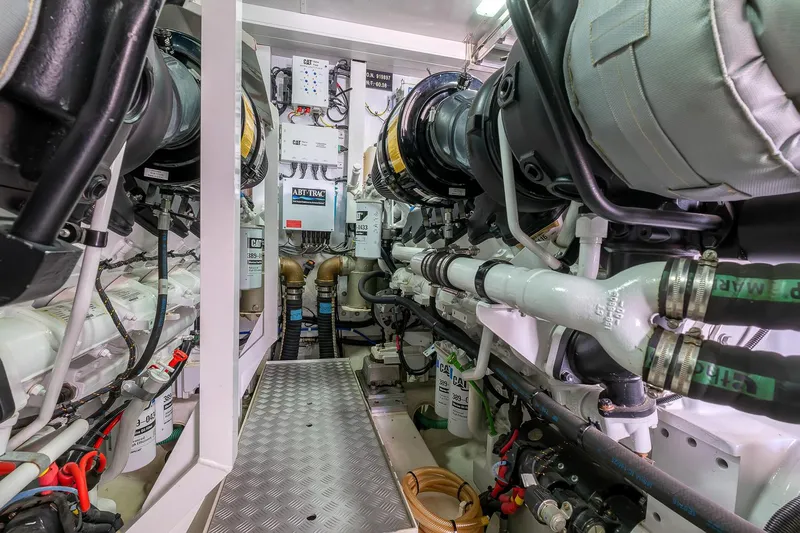  Yacht Photos Pics Engine room of a 2014 Princess 72 Motor Yacht, showcasing machinery and equipment.