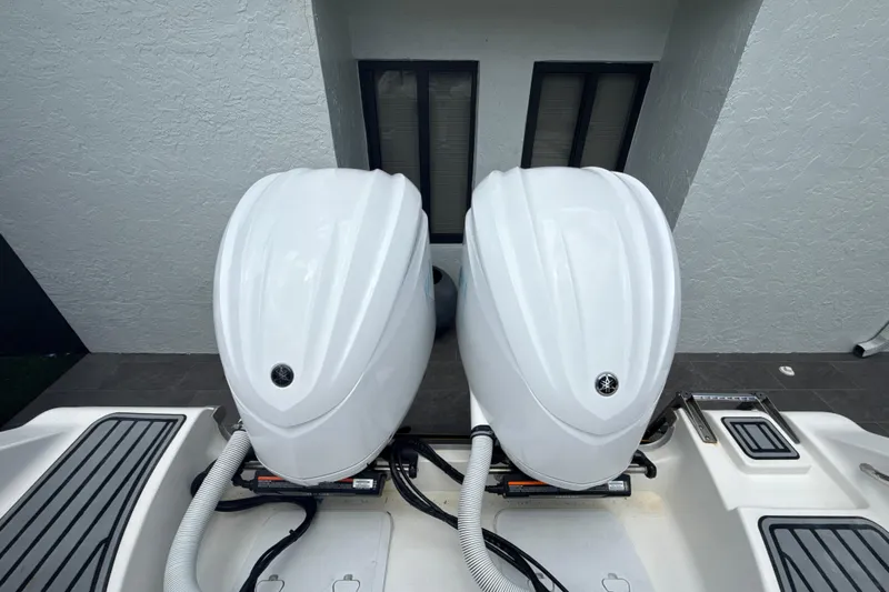  Yacht Photos Pics Twin outboard engines on a 2022 Tidewater 280 CC Adventure boat.