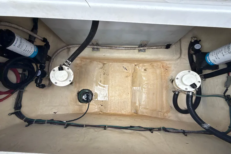  Yacht Photos Pics Bilge area of 2022 Tidewater 280 CC Adventure boat with pumps and wiring.