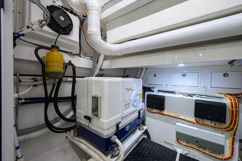 Patriot Yacht Photos Pics Engine room of 2023 Valhalla Boatworks vessel with generator and wiring.