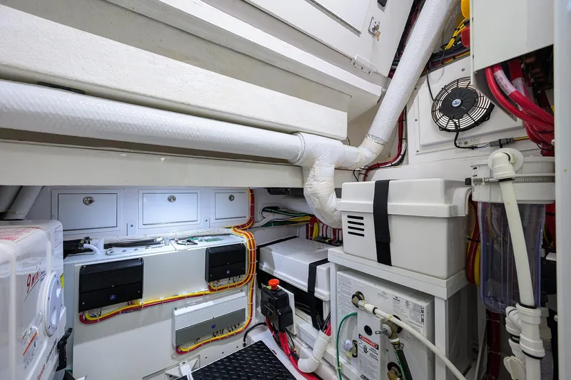 Patriot Yacht Photos Pics Engine room of 2023 Valhalla Boatworks vessel, showcasing organized wiring and equipment.
