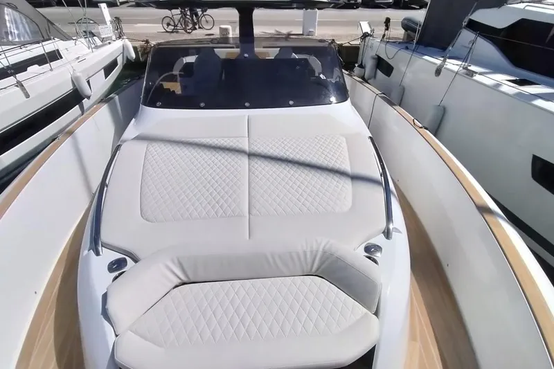  Yacht Photos Pics 2024 Solaris Power 44 Open yacht with luxurious deck seating and sleek design.