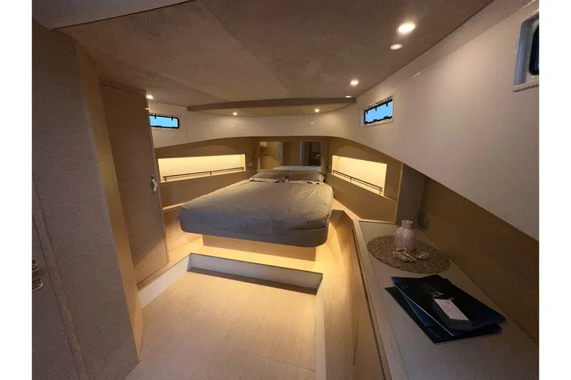  Yacht Photos Pics Luxurious interior cabin of 2024 Solaris Power 44 Open yacht, featuring modern design and ambient lighting.