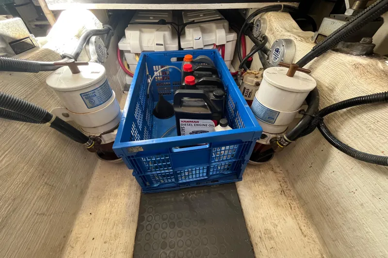 Shibumi Yacht Photos Pics Engine room of 2004 Sabre 42 Hardtop Express with diesel oil containers and filters.