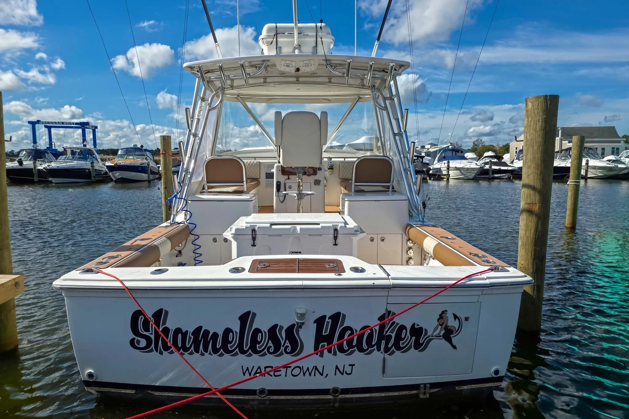 2005 Buddy Davis 35' Express boat docked in Waretown, NJ marina.