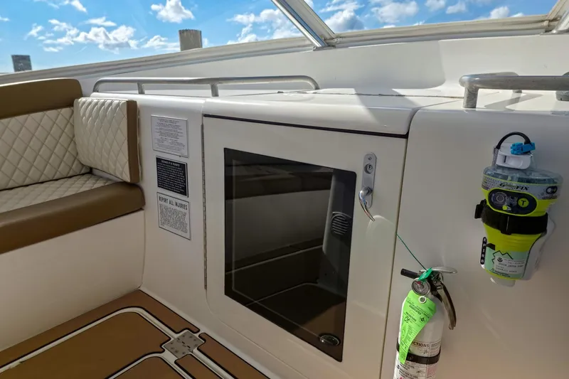  Yacht Photos Pics 2005 Buddy Davis 35' Express boat interior with seating, storage, and safety equipment.