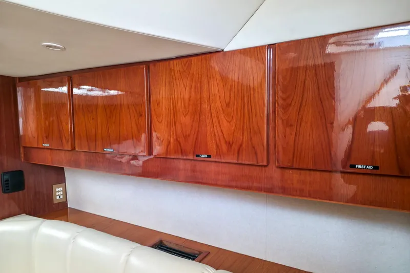  Yacht Photos Pics Interior view of 2005 Buddy Davis 35' Express with polished wooden cabinets.