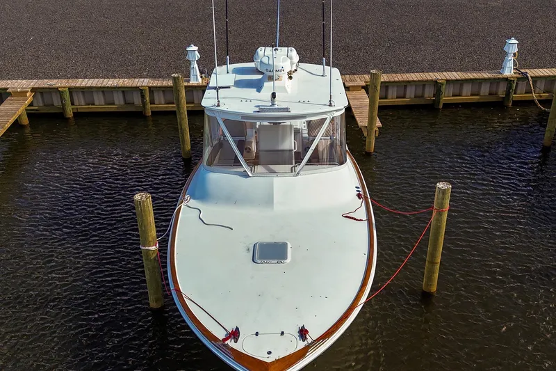  Yacht Photos Pics 2005 Buddy Davis 35' Express boat docked at marina, aerial view.