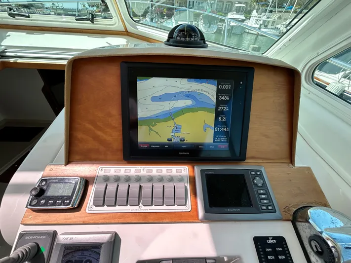  Yacht Photos Pics Helm of 2014 Back Cove Downeast 37 with navigation display and controls.