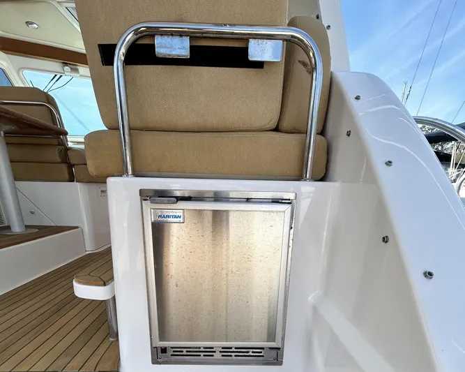  Yacht Photos Pics 2014 Back Cove Downeast 37 interior with stainless steel appliance and beige seating.