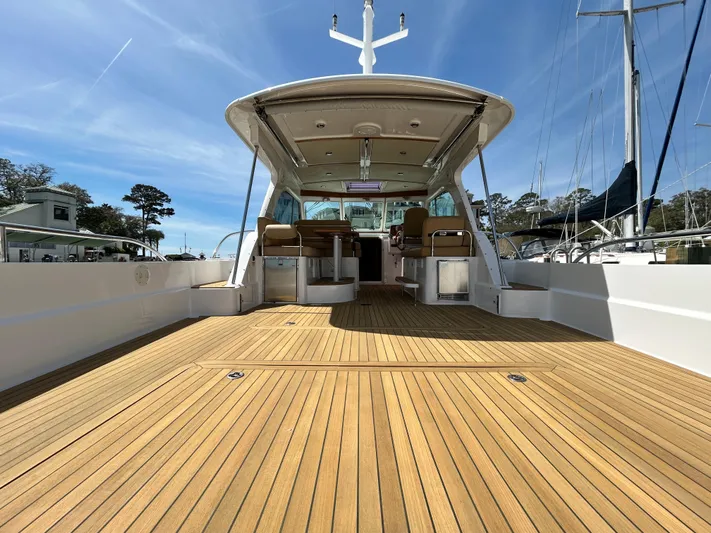  Yacht Photos Pics 2014 Back Cove Downeast 37 yacht with spacious teak deck and modern design.