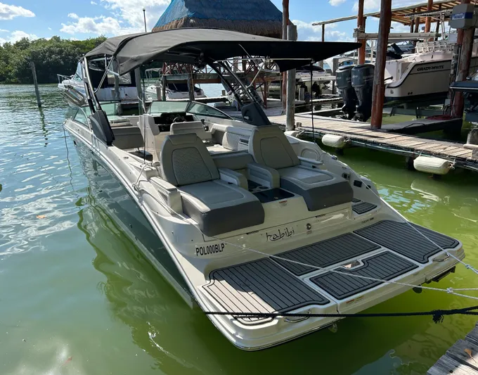 2022 Sea Ray 290 Sdx @ Cancun Yacht Photos Pics 2022 Sea Ray SDX 290 boat docked in a marina, featuring sleek design and spacious seating.