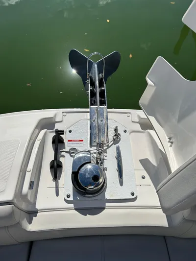 2022 Sea Ray 290 Sdx @ Cancun Yacht Photos Pics 2022 Sea Ray SDX 290 boat anchor system on deck, near calm water.