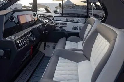  Yacht Photos Pics Interior of 2025 Hanover 387 Classic Luxury Edition boat with modern dashboard and plush seating.