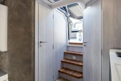  Yacht Photos Pics Interior of 2025 Hanover 387 Classic Luxury Edition with wooden steps and modern design.