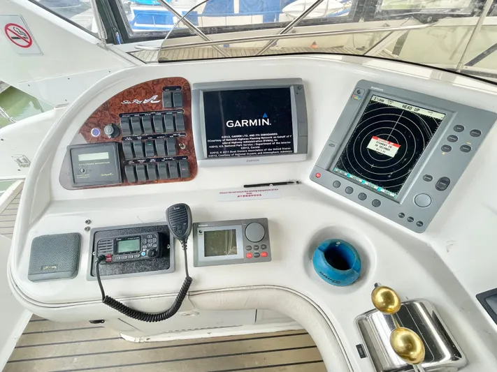  Yacht Photos Pics Control panel of a 2000 Sea Ray 450 Express Bridge with Garmin navigation system.