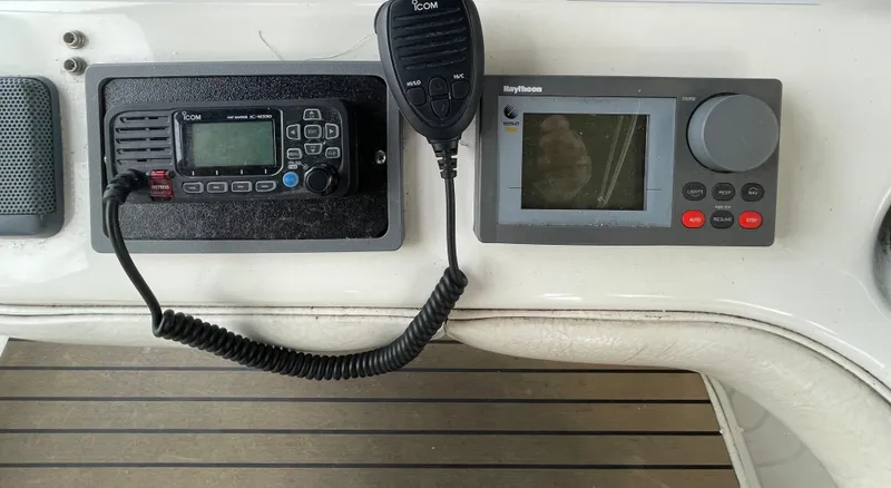  Yacht Photos Pics Control panel of a 2000 Sea Ray 450 Express Bridge with communication and navigation equipment.