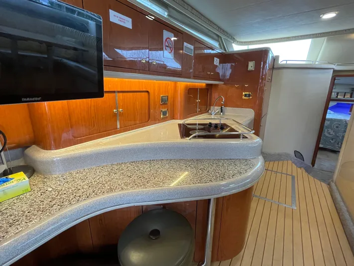 Yacht Photos Pics Luxurious interior of 2000 Sea Ray 450 Express Bridge yacht kitchen area.
