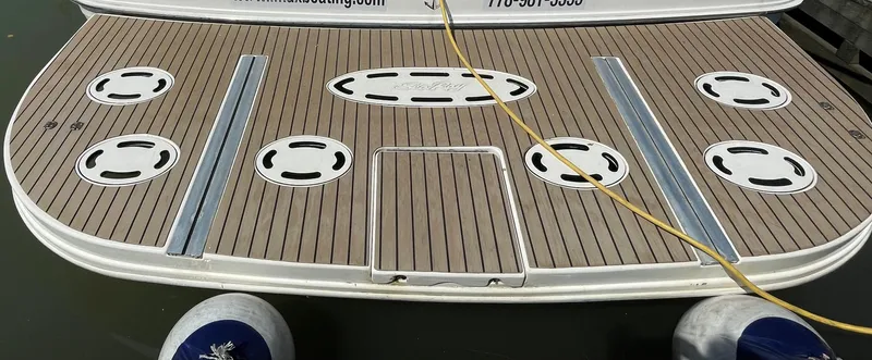  Yacht Photos Pics Swim platform of a 2000 Sea Ray 450 Express Bridge boat with teak decking.