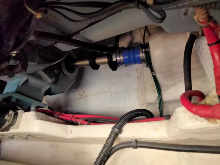 Ancora Yacht Photos Pics Engine compartment of a 1997 Tiara Yachts 40' Tiara Express, showing mechanical components and wiring.