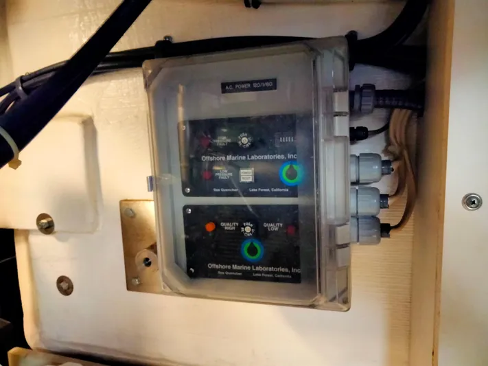 Ancora Yacht Photos Pics Electrical panel in 1997 Tiara Yachts 40' Tiara Express, featuring Offshore Marine Laboratories equipment.