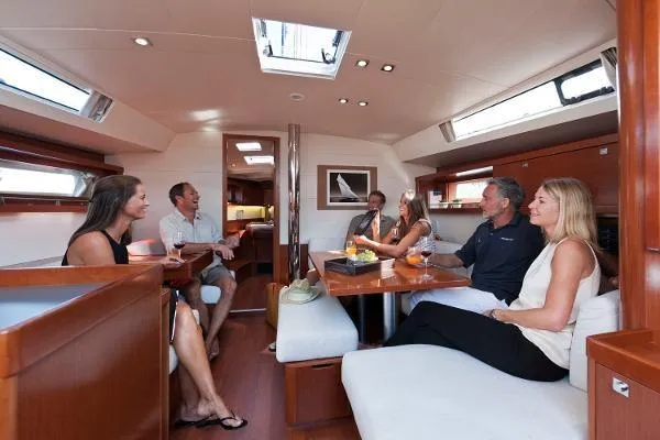 Secret Location Yacht Photos Pics People enjoying the interior of a 2014 Beneteau Oceanis 45 yacht.