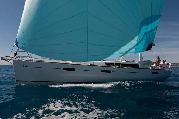 Secret Location Yacht Photos Pics 2014 Beneteau Oceanis 45 sailing with blue sails on open water.