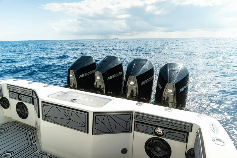  Yacht Photos Pics 2019 SeaVee 390Z boat with four Mercury outboard engines on open ocean.