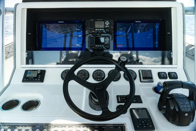  Yacht Photos Pics 2019 SeaVee 390Z helm with advanced navigation displays and controls.